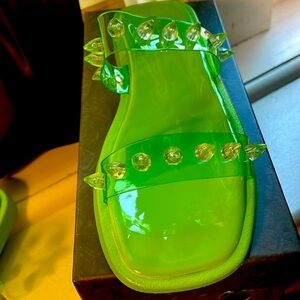 The Alyssa Jade green sandle w/ clear spikes size 8
